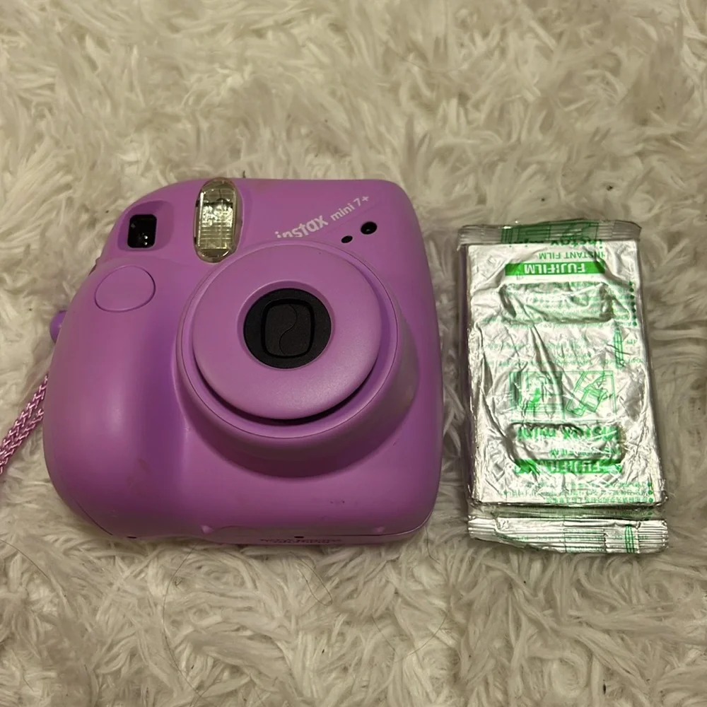 polaroid camera and extra film